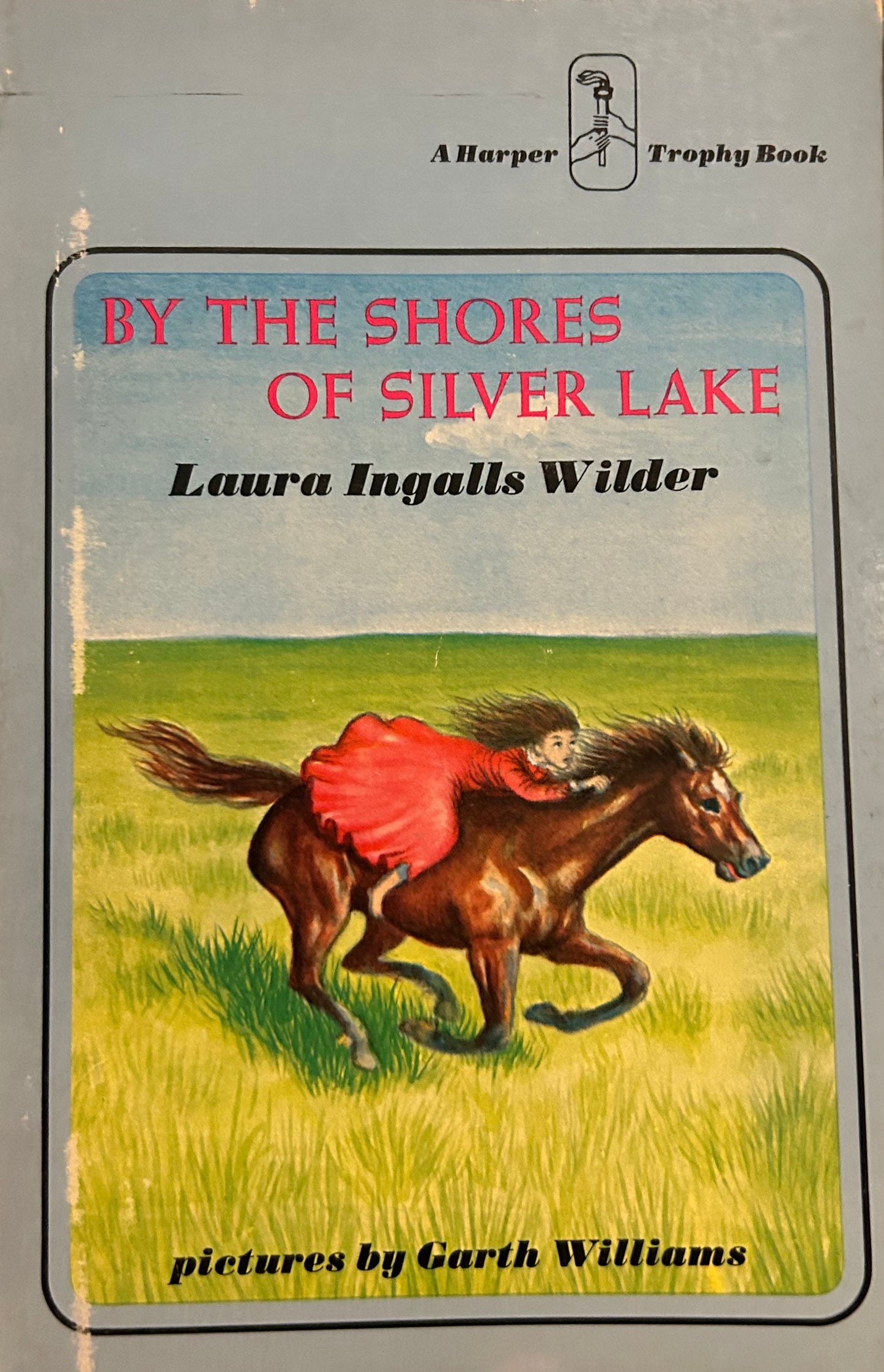 By the shores of Silver Lake by Laura Ingalls Wilder ( Book 5)