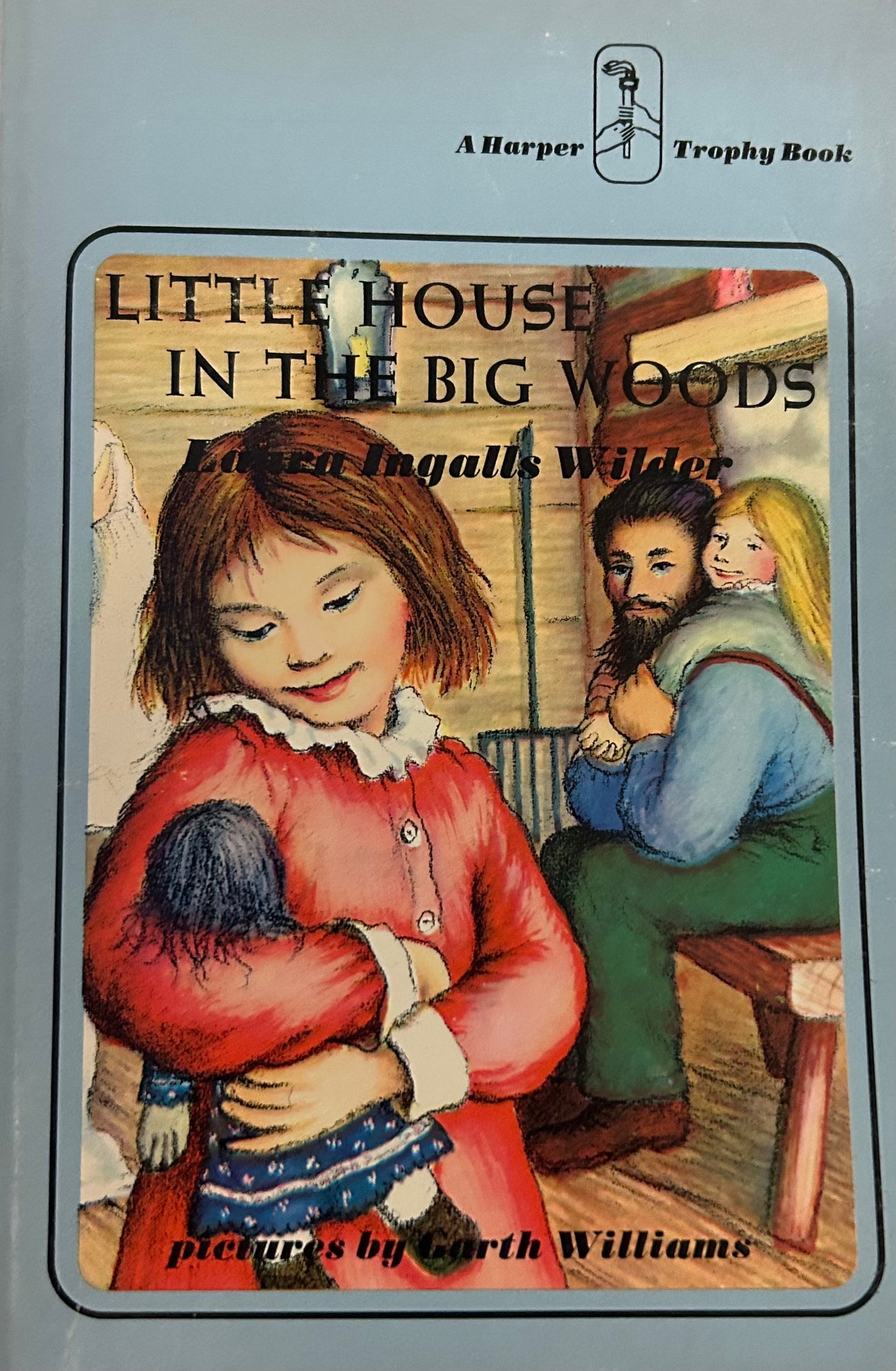 Little House in the Big Woods by Laura Ingalls Wilder (Book 1)