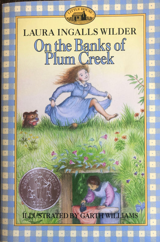 On the Banks of Plum Creek by Laura Ingalls Wilder ( Book 4)